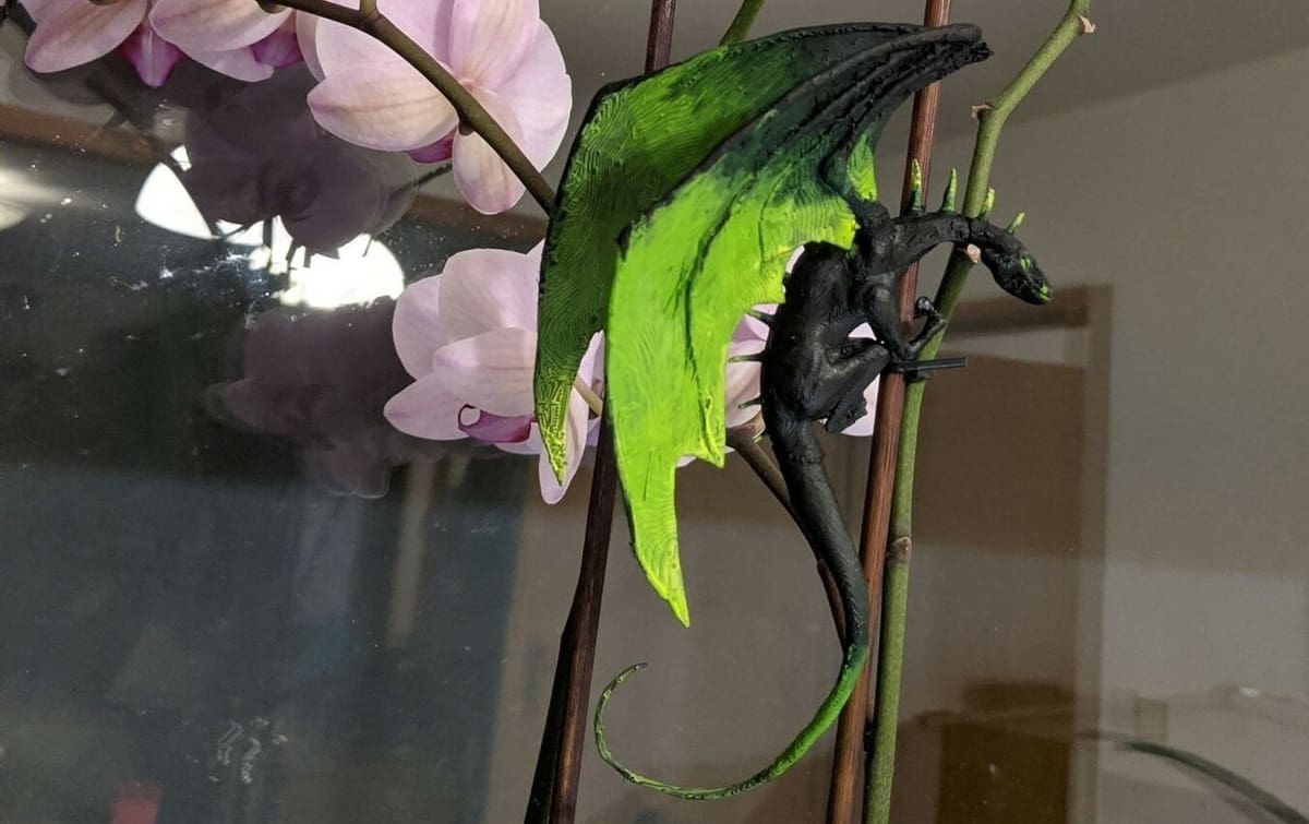 Alpha, assembled and perched atop a flower