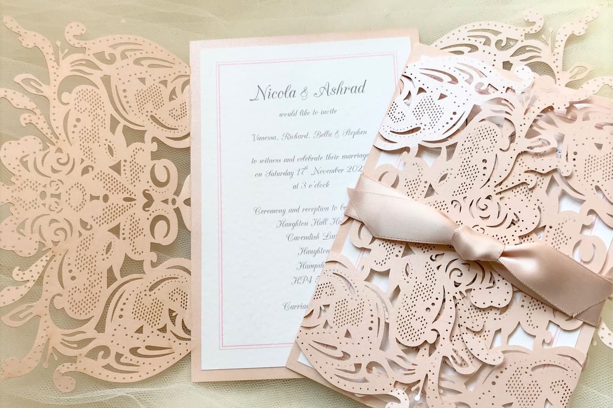 Custom wedding invitations are a beautiful use of laser cut paper