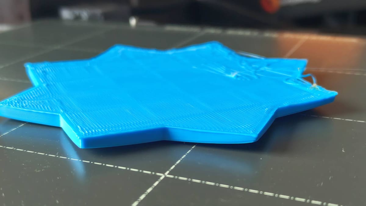 Image of 3D Printing Troubleshooting: 3D Printing Problems & Solutions (FDM & Resin): Print Edges are Bending (Warping)
