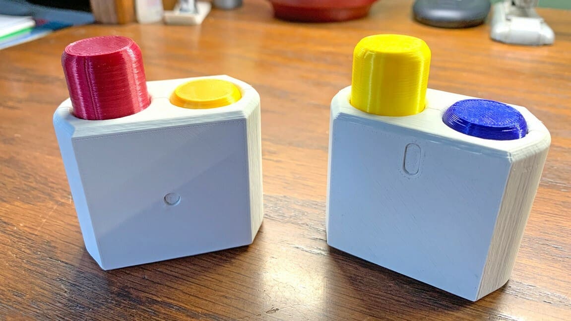 The movement of these buttons resembles that of a seesaw