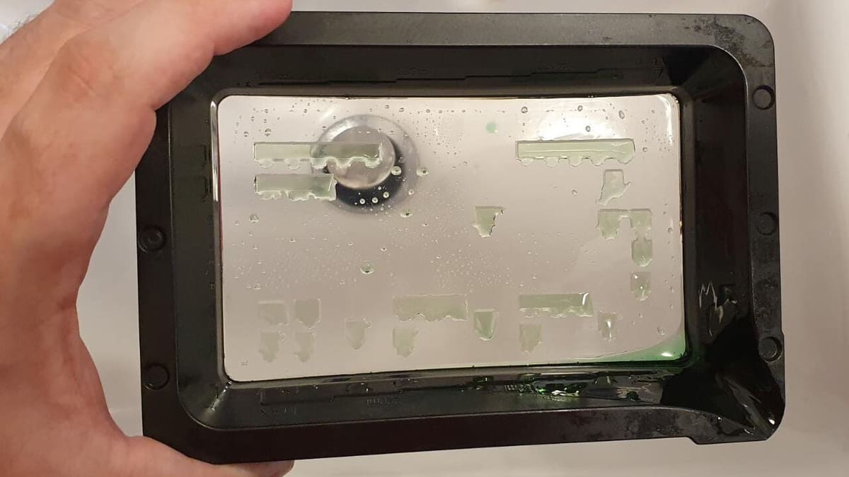 Cured resin stuck to the film