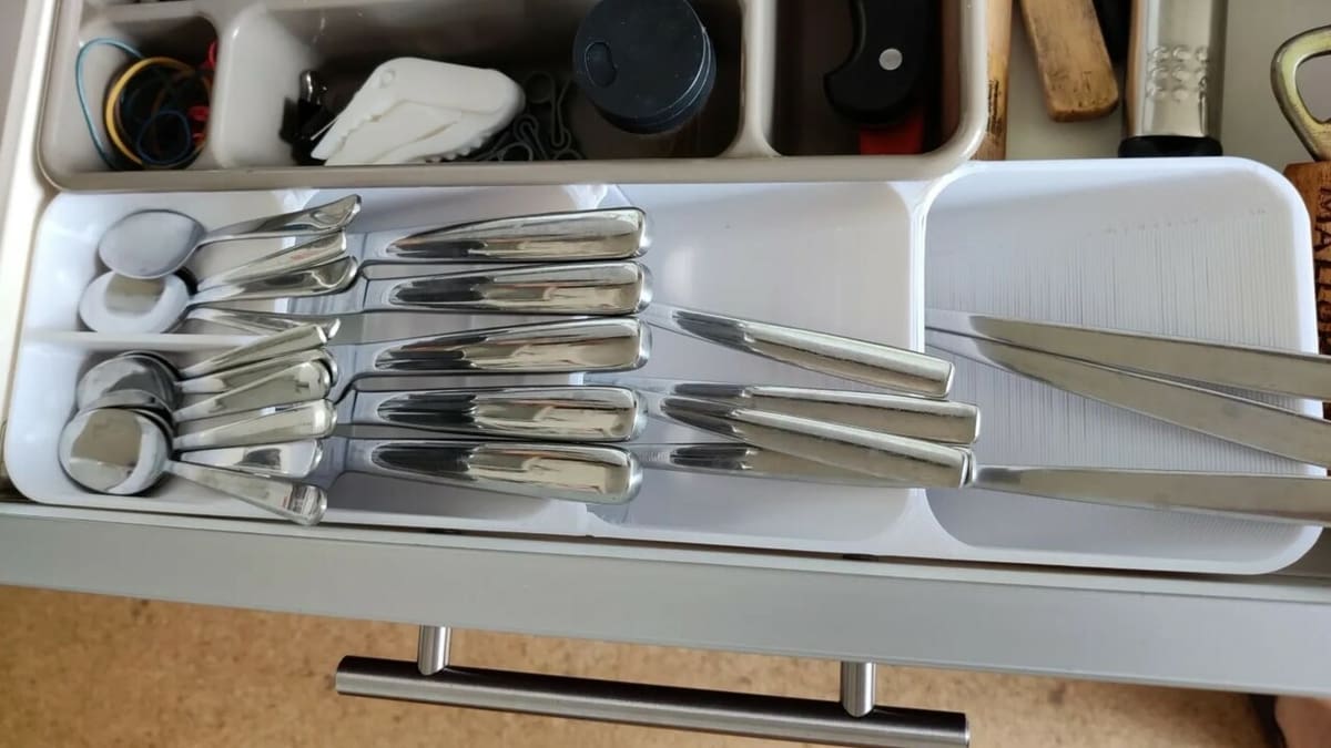 This tray can also hold other kitchen tools like a peeler, openers, and hand juicers