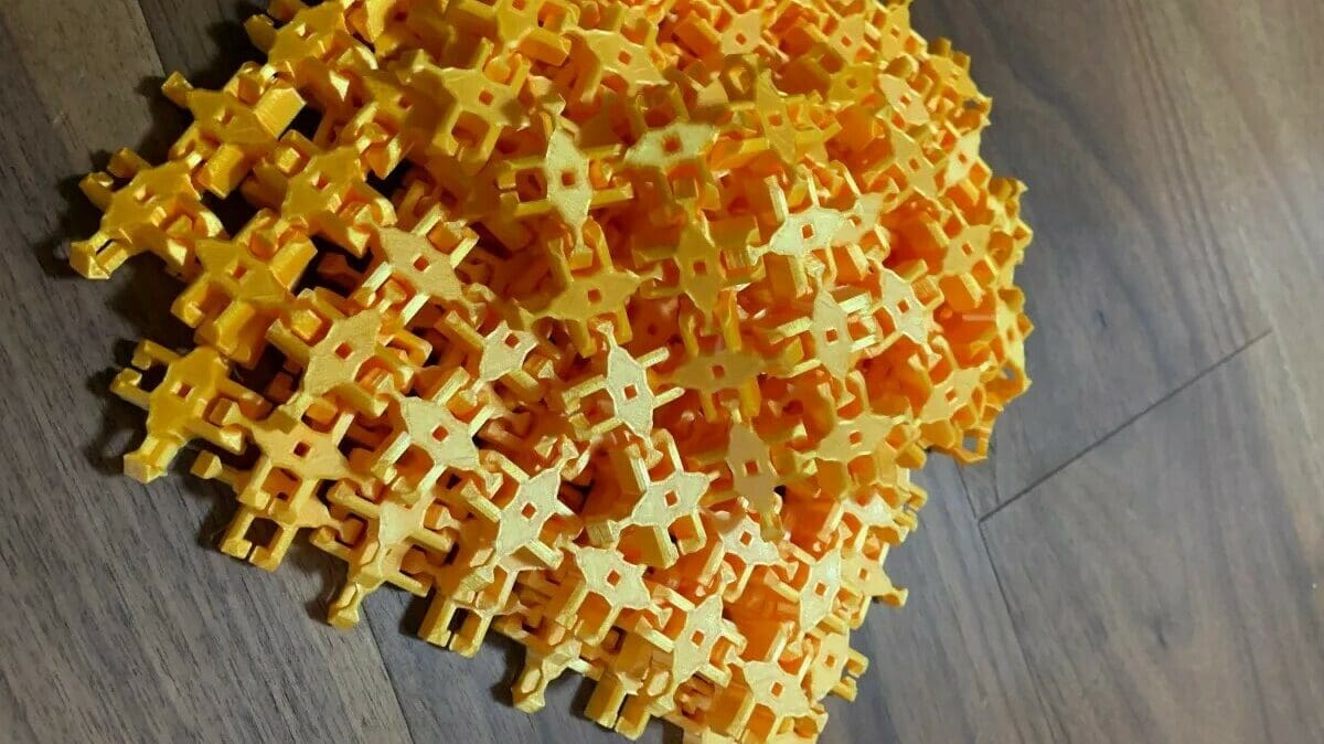 Many sheets of snap-together chainmail can be combined into one large sheet