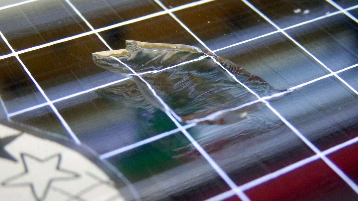 If the parts get stuck to the glass bed, don't pull