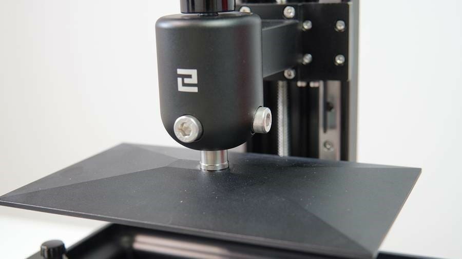 Secure and level the plate in place before starting a print