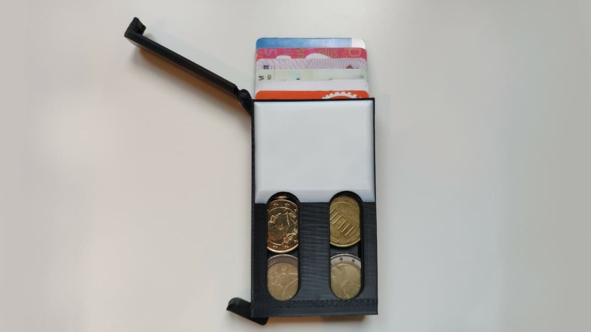 The coin and bill slot allows you to see them at a glance and easily remove them