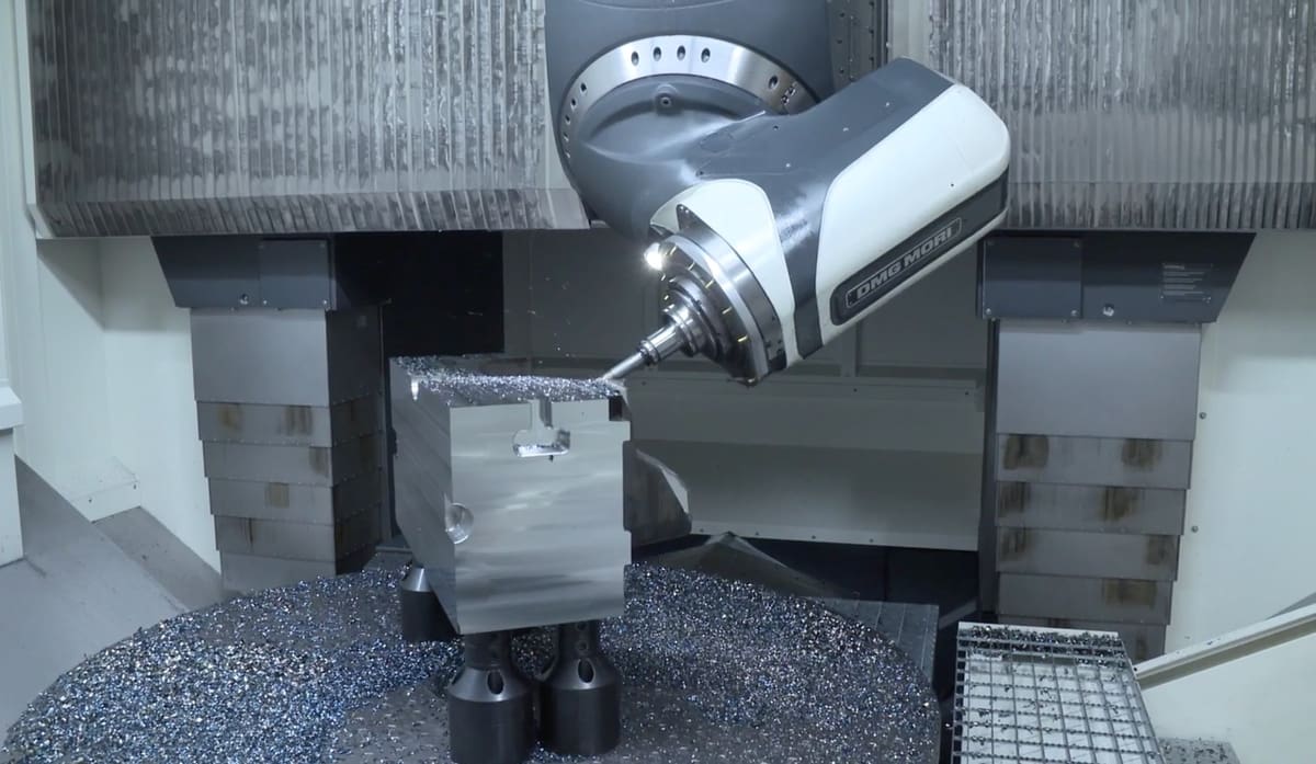 5-axis CNC mills complex shapes out of stock