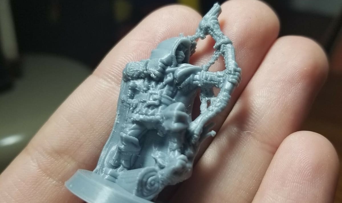 A minifig printed on an Ender 3 with a 0.1-mm layer height