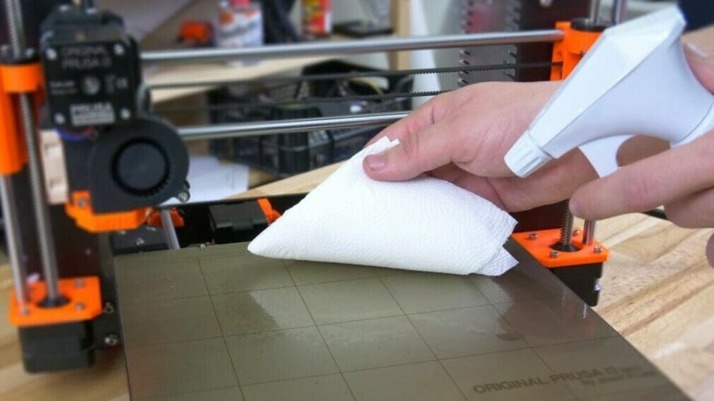 A cloth, especially a microfiber one, along with some water is a great way to clean the bed