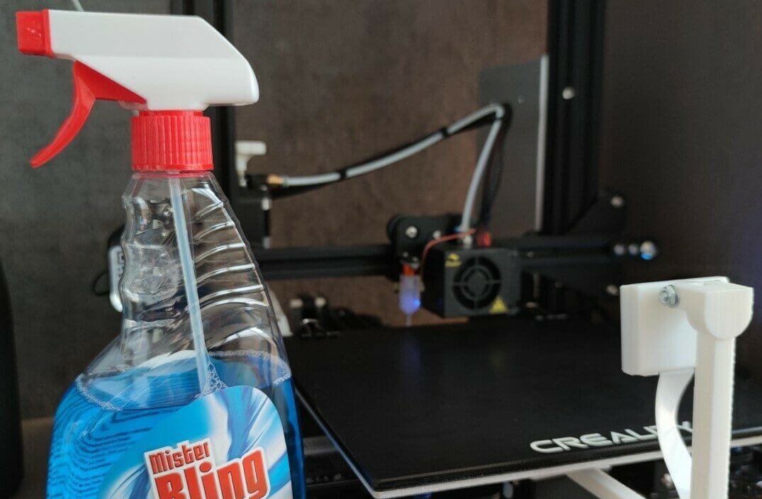 Window cleaner, along with a cloth or sponge, cleans glass build plates very well