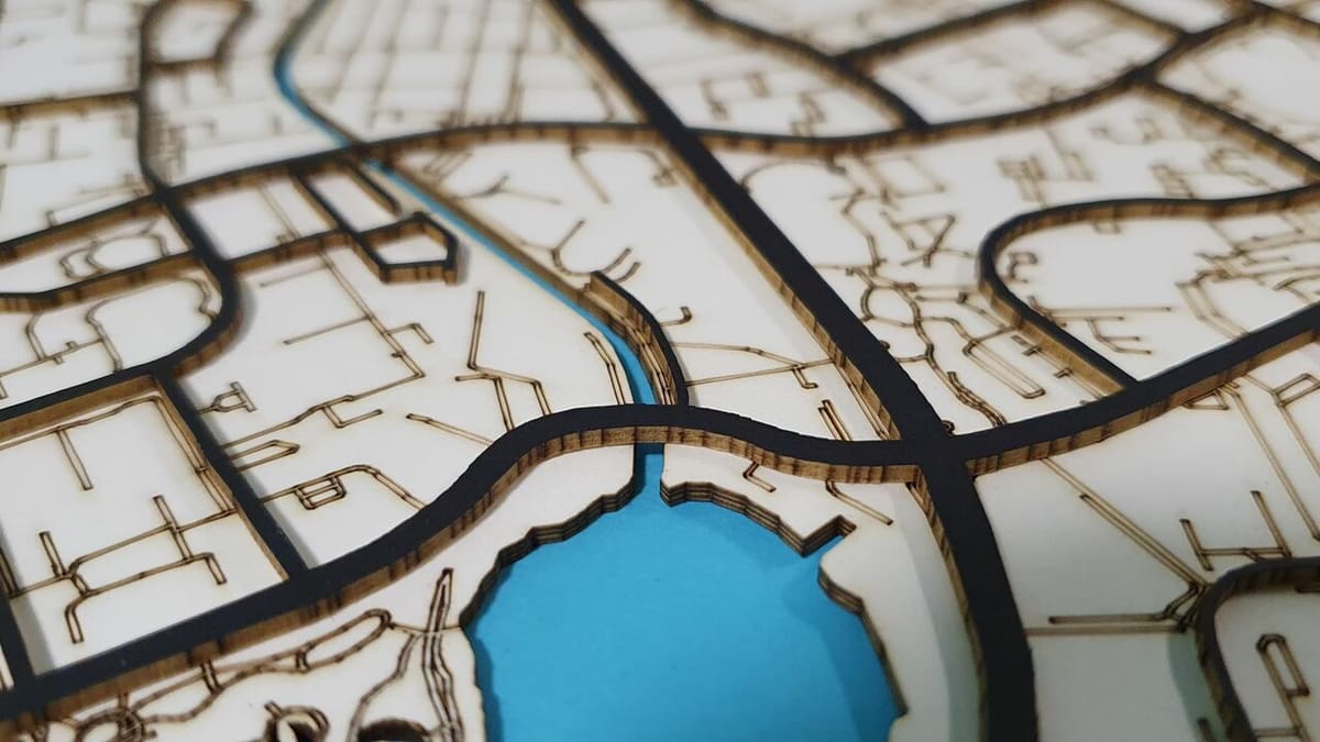 A laser cutter, wood, some paint, and your imagination