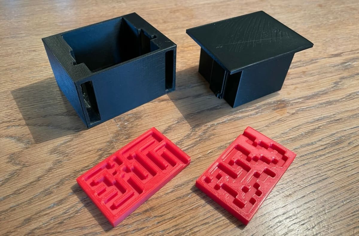 This design is made up of four components, including two maze pieces