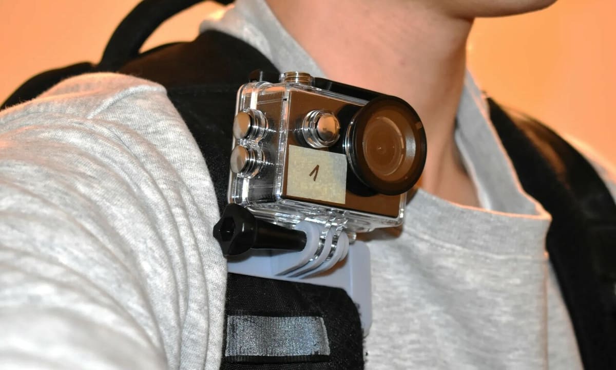 This convenient mount will fit most backpacks
