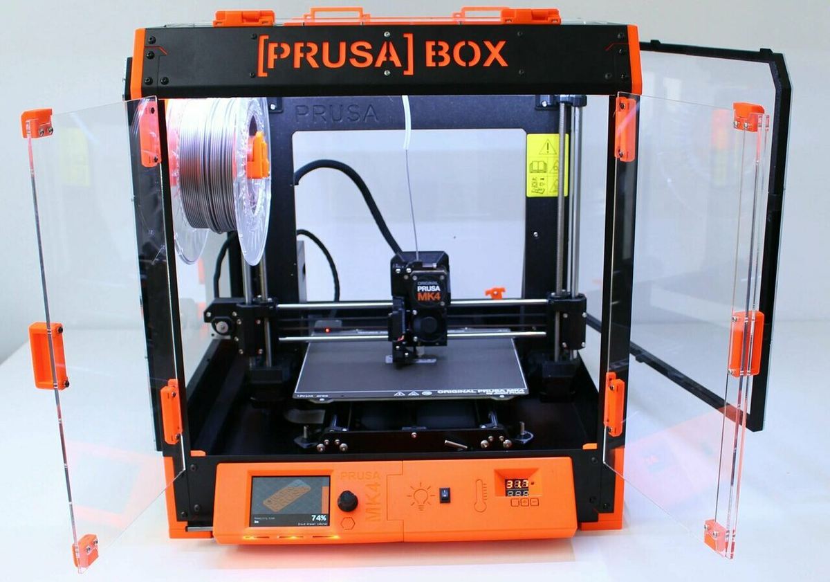 A partially printed enclosure for a partially printed printer