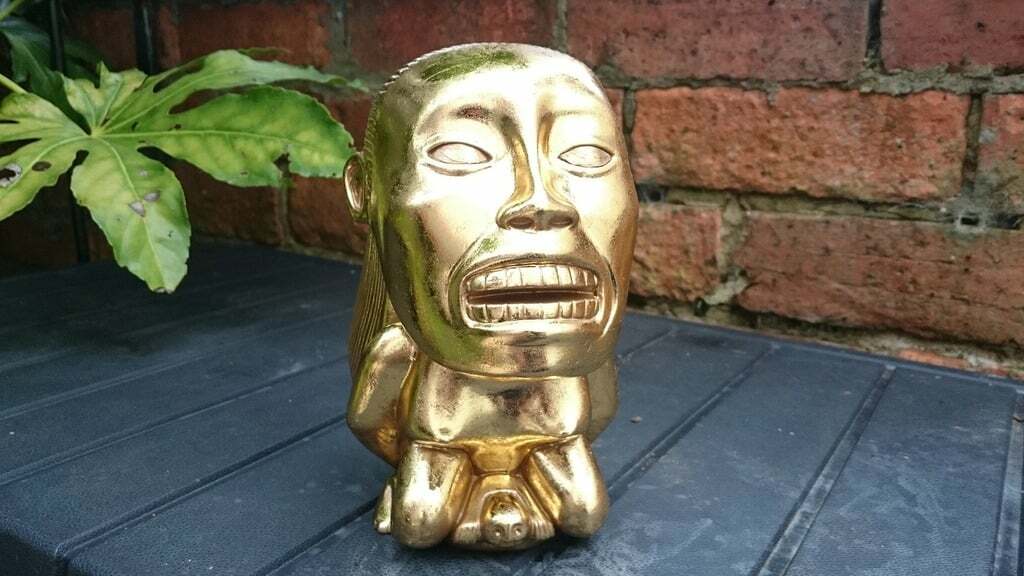 How much would this golden idol weigh?