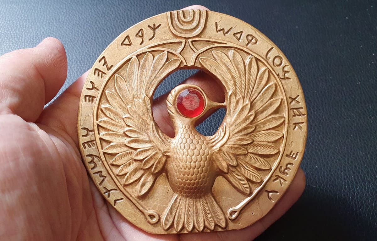And it's capped with an elaborate headpiece in the shape of the Sun