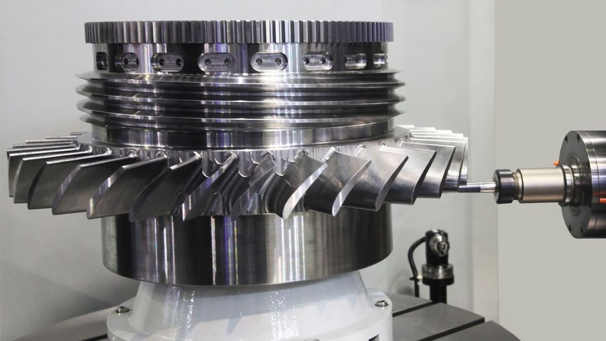 A CNC Mill cutting a complex part out of metal