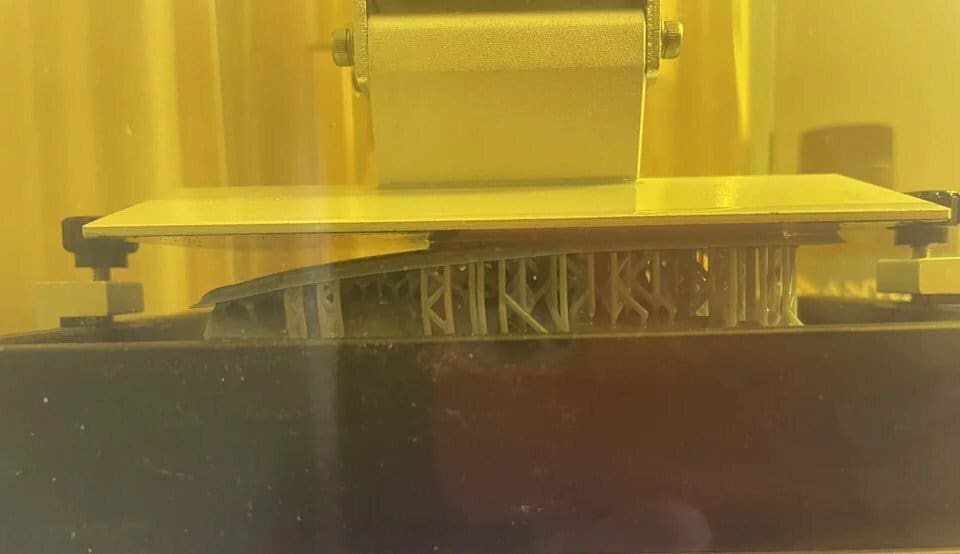 This raft lacked proper bed adhesion and ruined the print