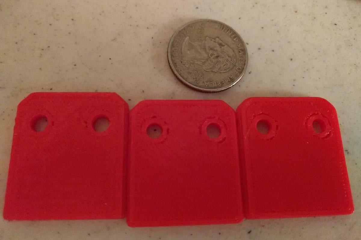 The right most print shows overly smoothed corners from over-tuned Input Shaping