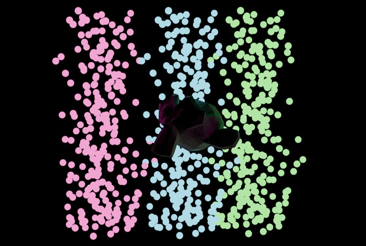Rendered shot of Suzanne with colored particles