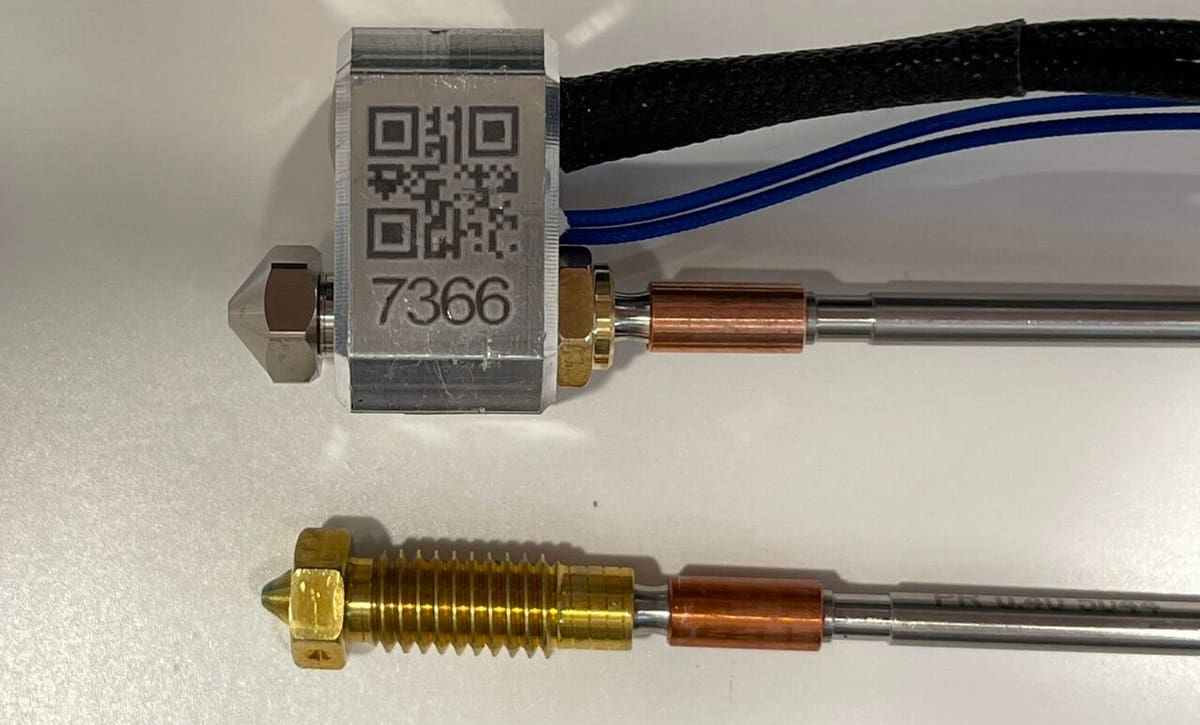 Nextruder nozzle next to installed V6 adapter