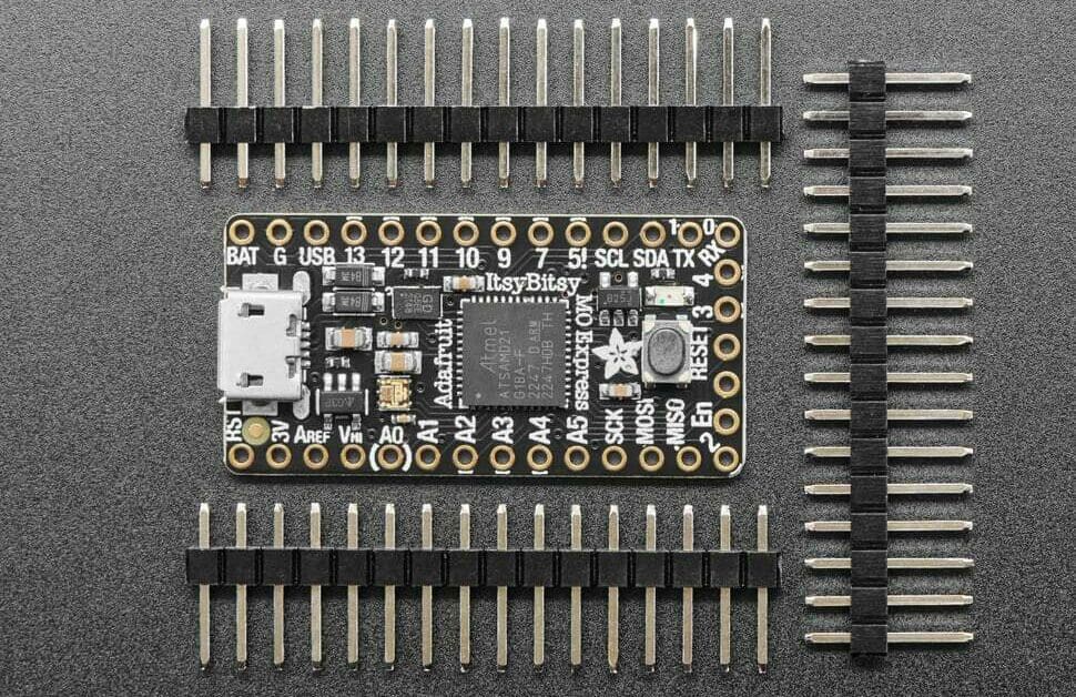 The ItsyBitsy thankfully comes with plenty of header pins
