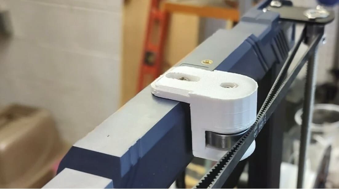 This tensioner is made up of two 3D prints and a regular ball bearing