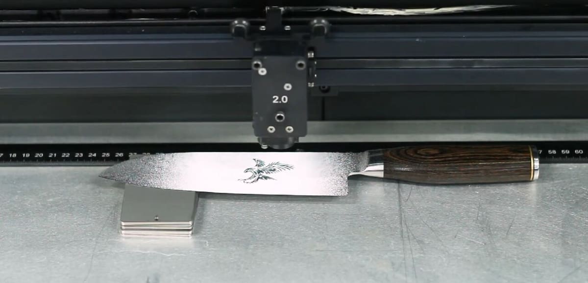 Laser etching in progress