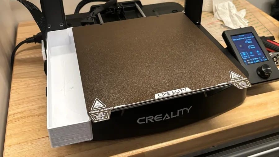 A PEI print bed is one of the easiest upgrade paths for your SE