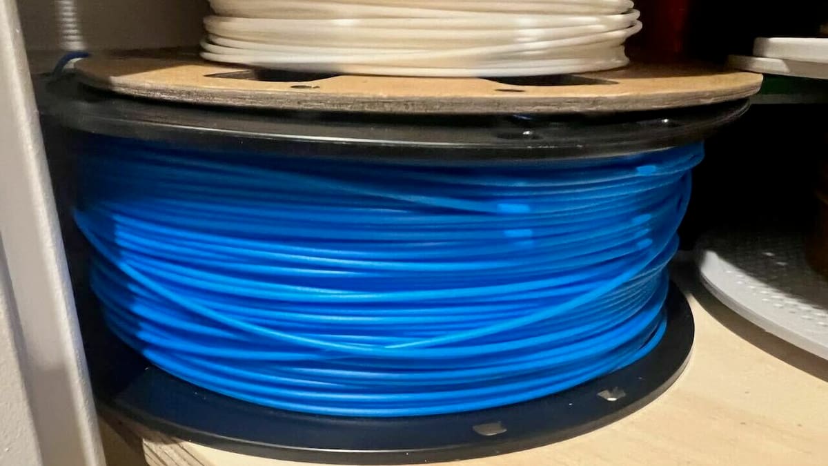 Plastic and cardboard spools can both be part of your setup