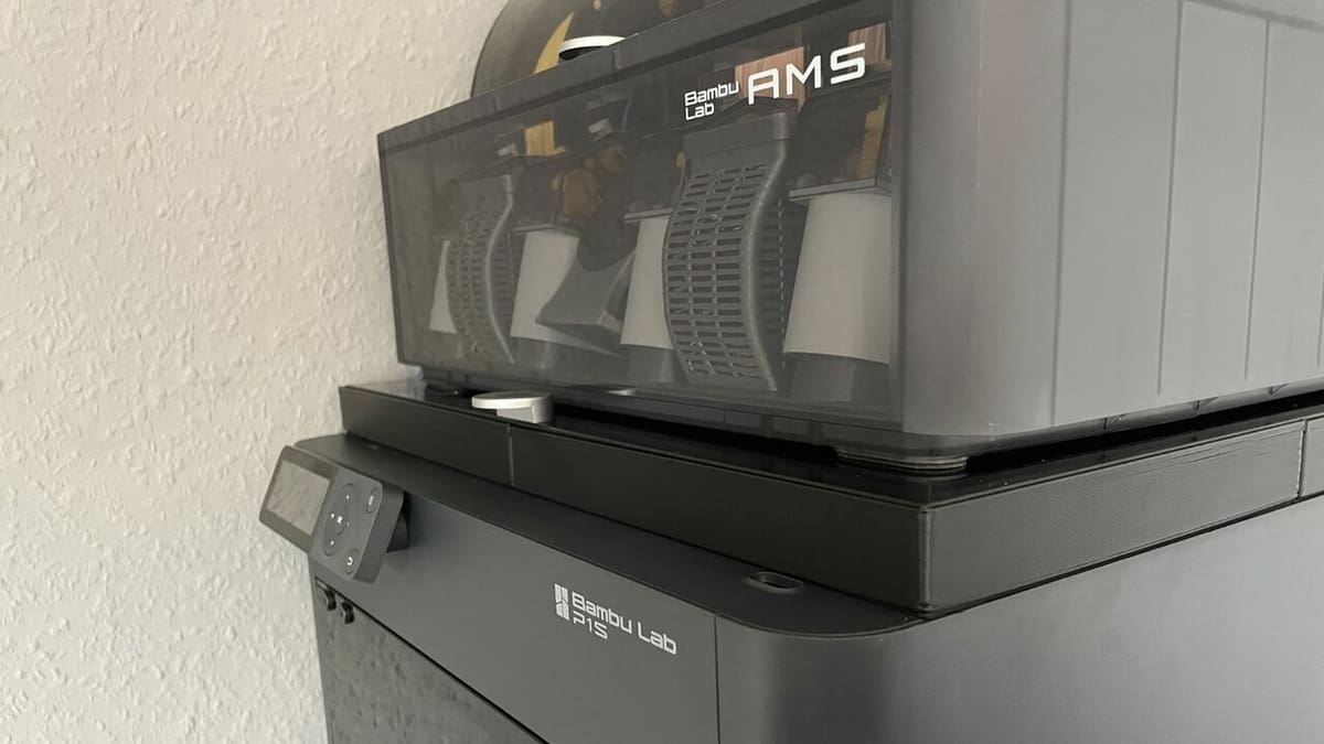 Bambu Lab P1S with AMS on top of it
