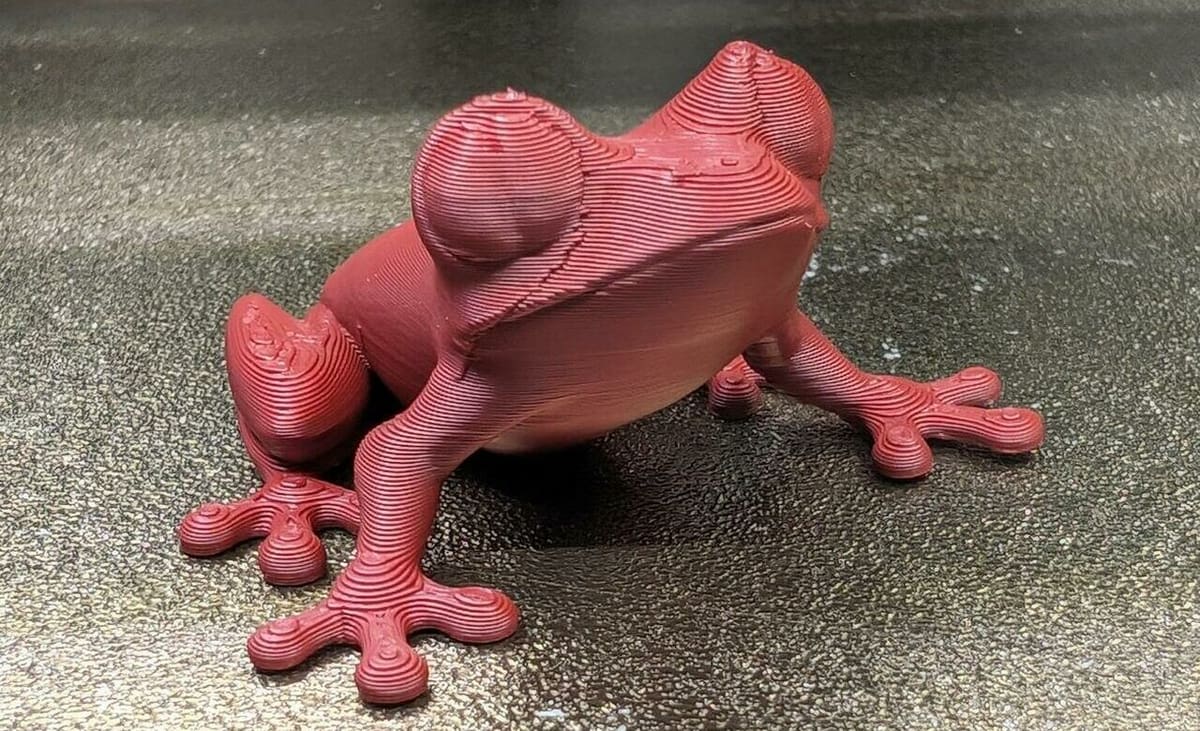 This tree frog might look plastic, but he's eco-friendly.