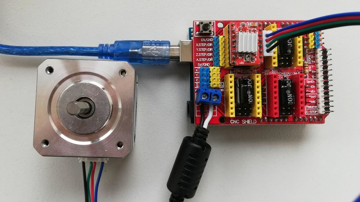 An Arduino with CNC shield and stepper motor