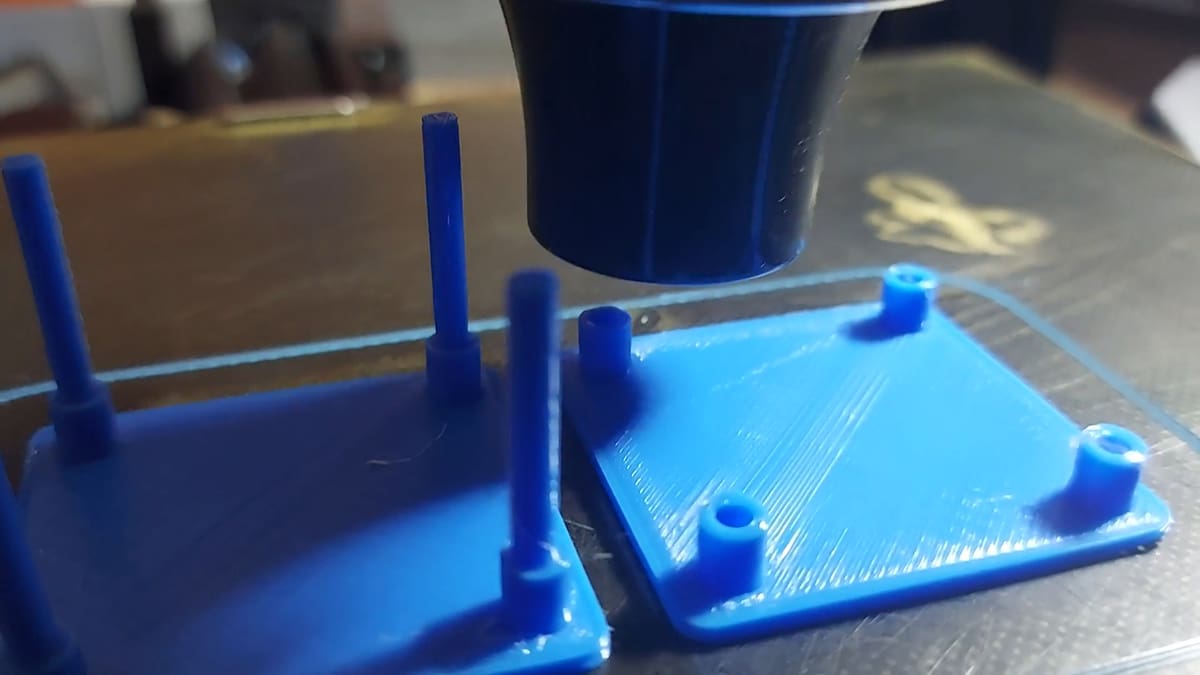 A hair dryer can be used for to remove stringing on PLA