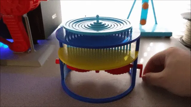 A mesmerizing kinetic sculpture mimicking a waterdrop